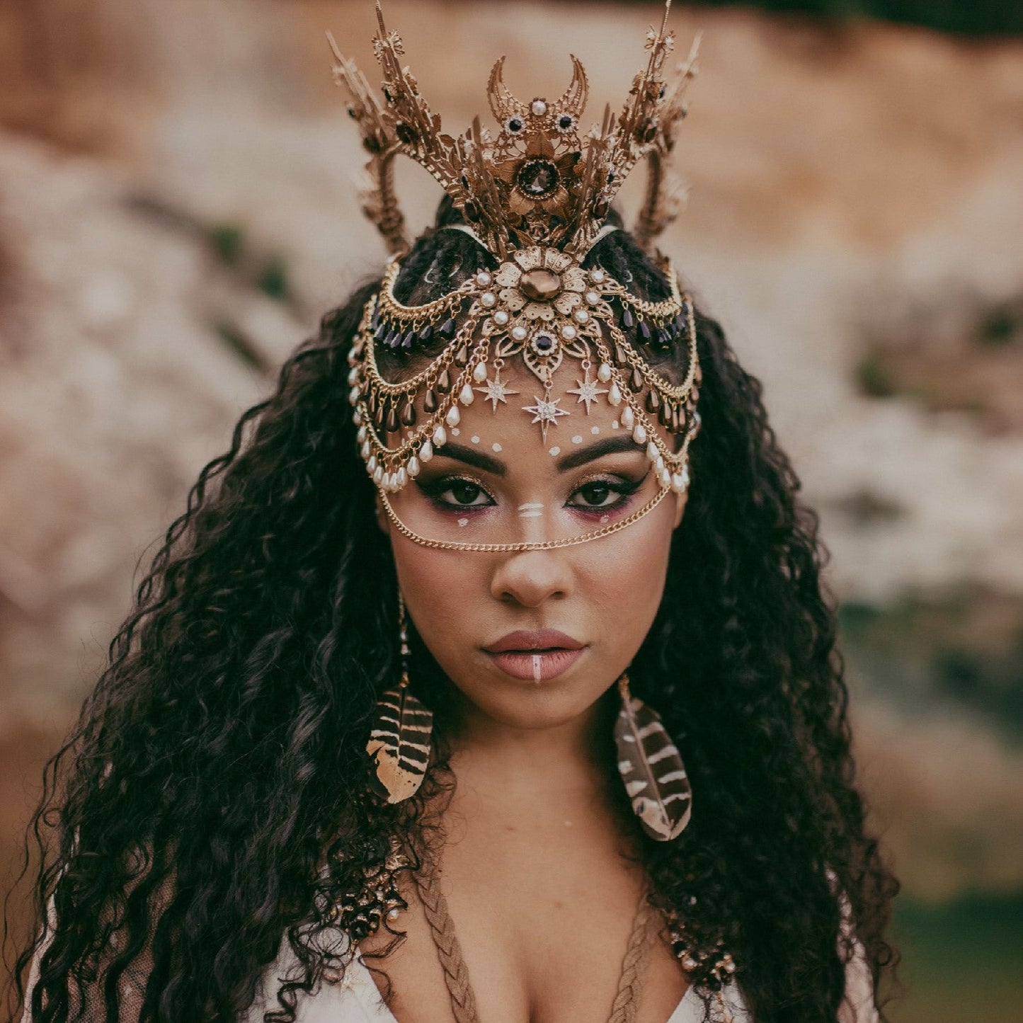 Custom festival crown and statement face jewelry created for a bold dream outfit by Carbickova Crowns.
