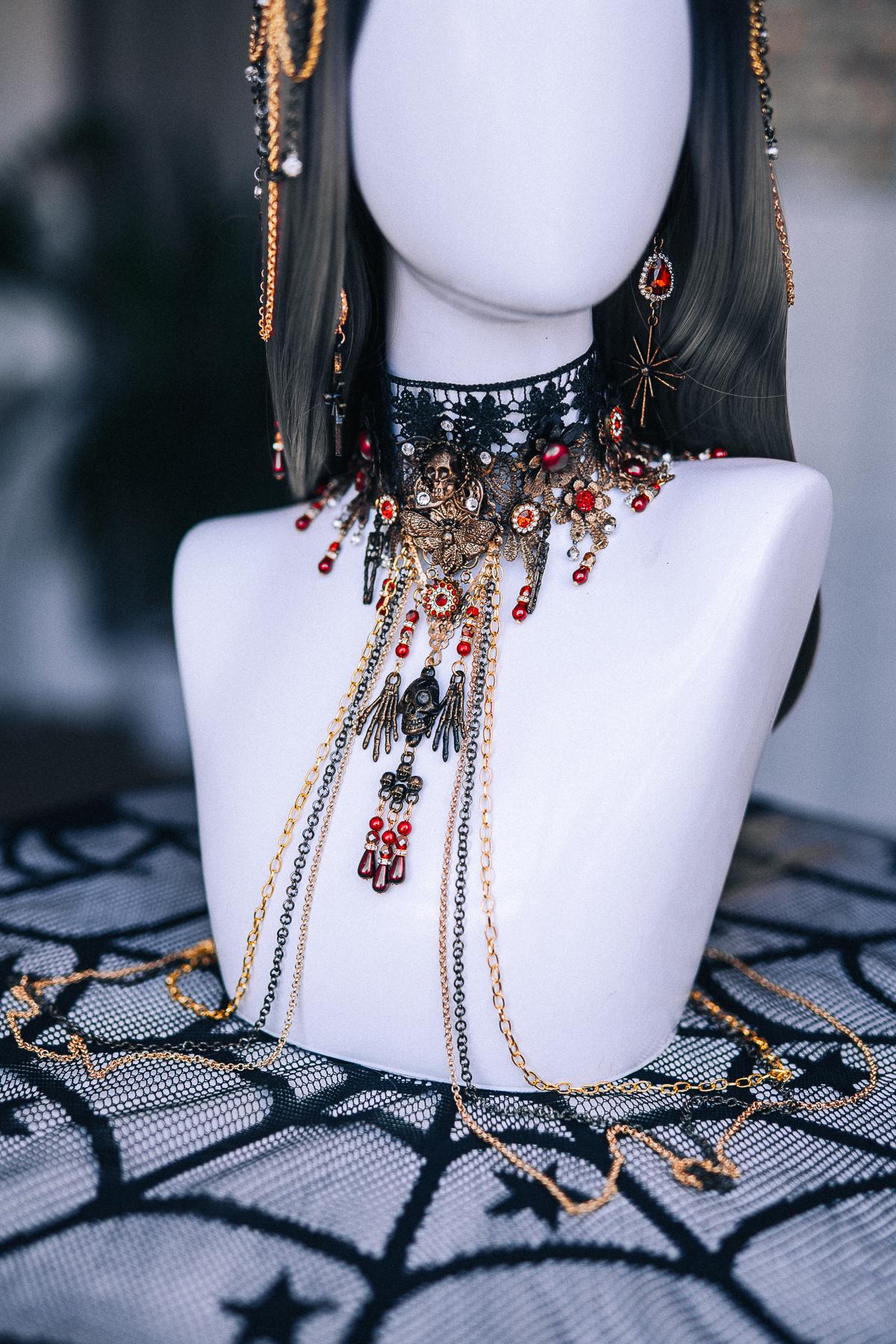 Gothic Red Crystal Dangle Earrings with Black Starburst Pendants and Ornate Filigree
