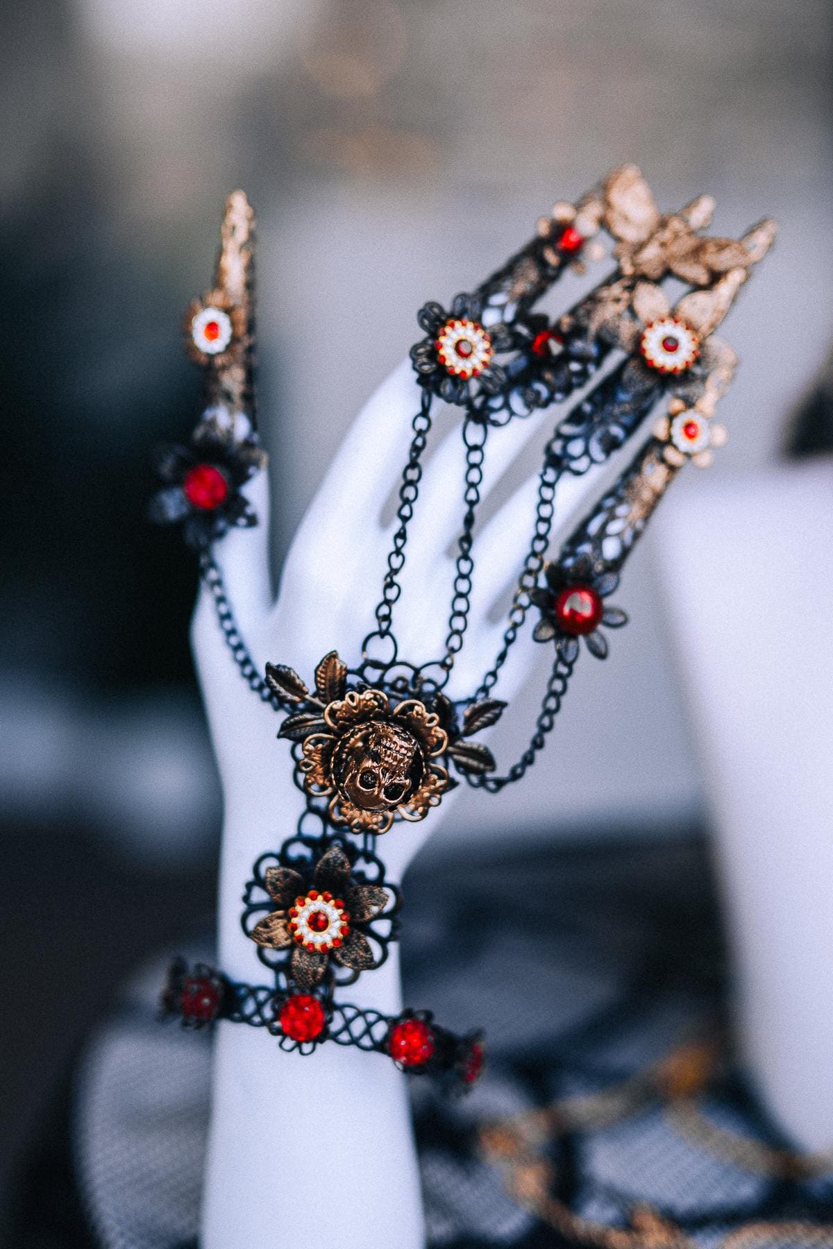 Gothic Red Crystal Dangle Earrings with Black Starburst Pendants and Ornate Filigree