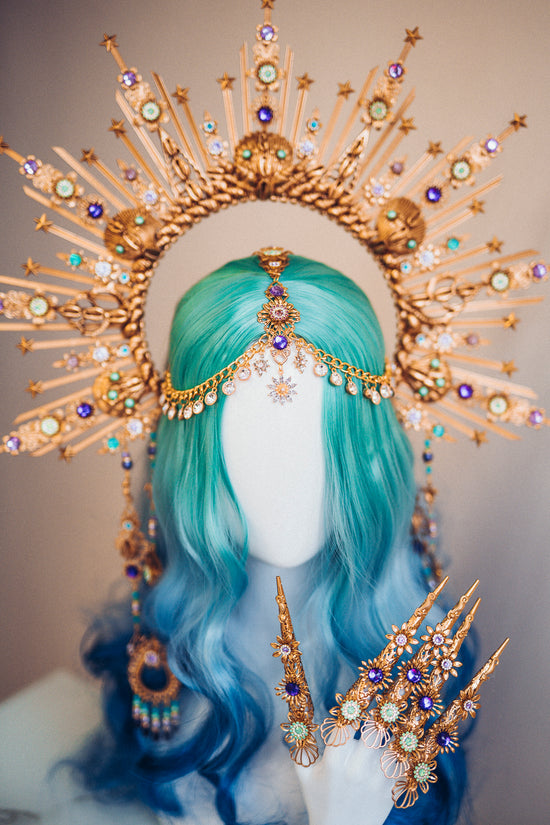 Mermaid headdress shells, gold, red hair, pearls on Craiyon
